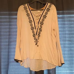 Cream V-neck blouse with bell sleeves